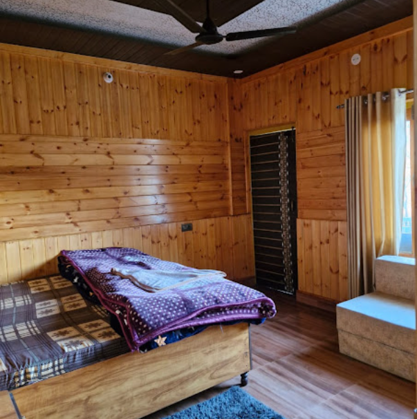 Twin bed room at A Day in Rajgundha