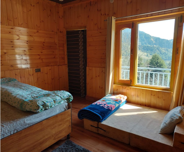Room with mountain view through window
